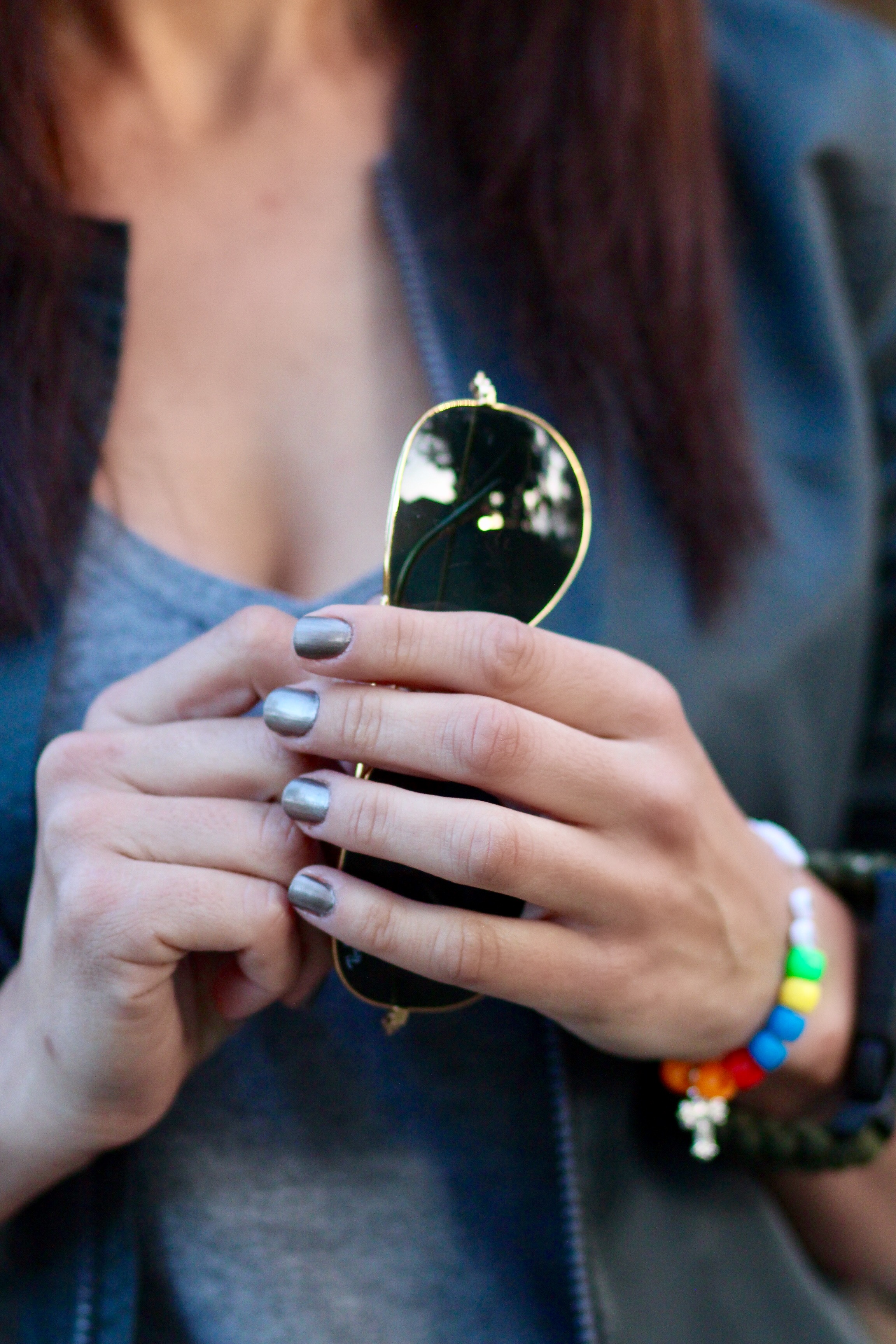 Aviator sunglasses and Essie steeling the scene nail polish